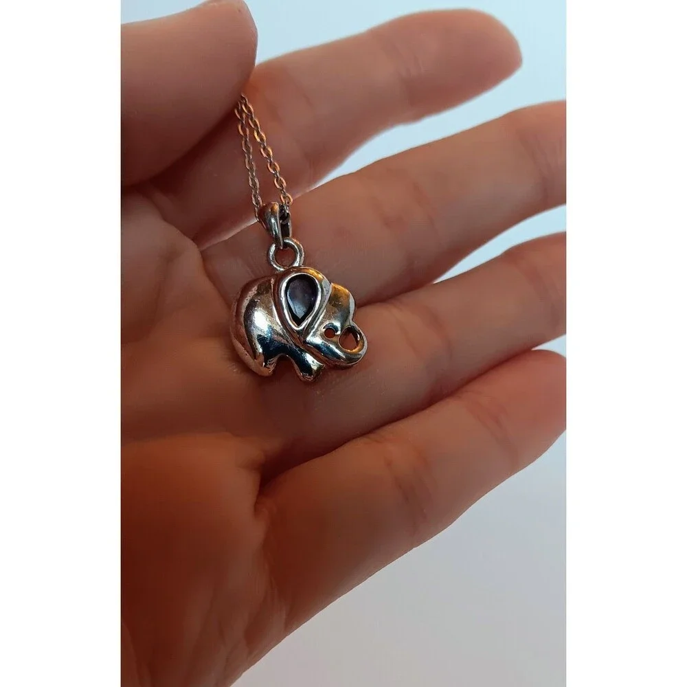 Avon Silvertone Birthstone Lucky Elephant Pendant Necklace